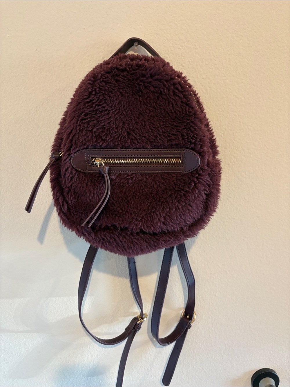 Express Shearling Backpack with gold hardware